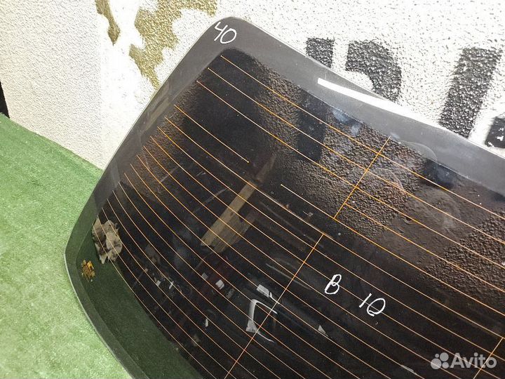 Стекло заднее на Nissan Almera Classic