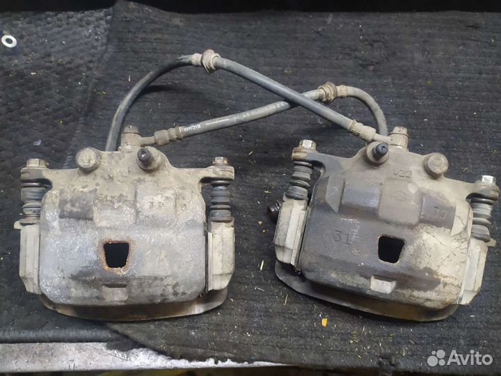 Суппорт левый QG15 (18) б/у