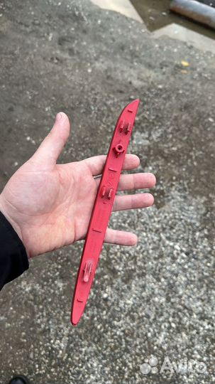 Отражатель заднего бампера левый