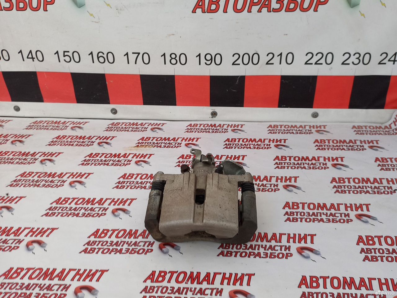 Супорт тормозной задний правый Форд Мустанг 6 2.3