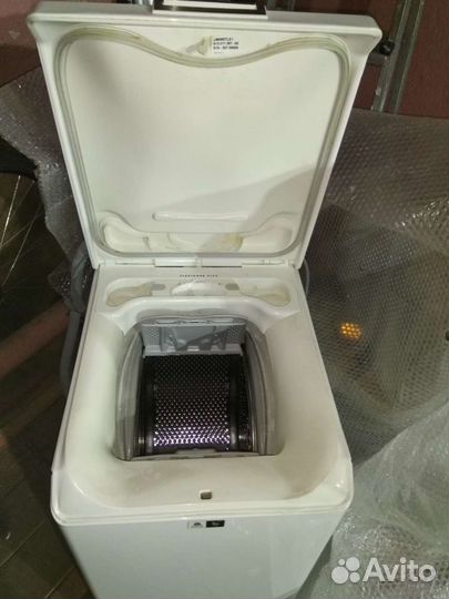 Стиральная машина AEG с вертикальной загрузкой