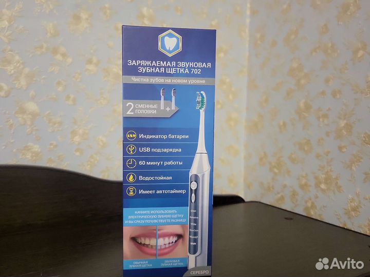 Электронная зубная щетка