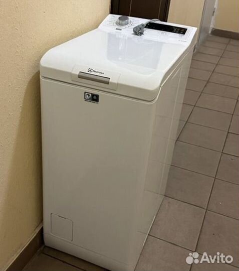 Стиральная машина с вертикальной загрузкой