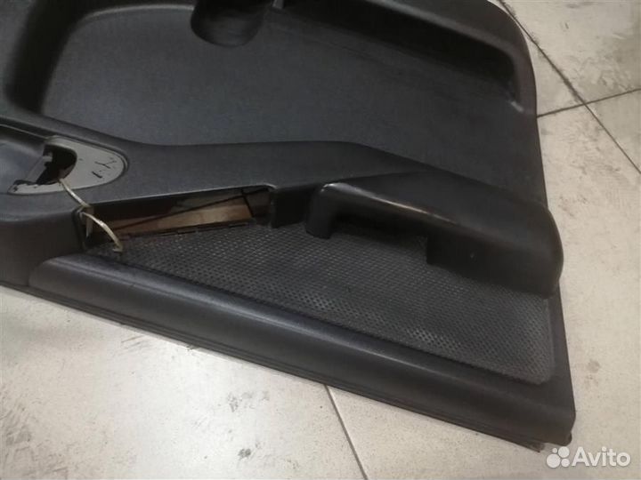 Обшивка двери передней левой Nissan Navara D40 20