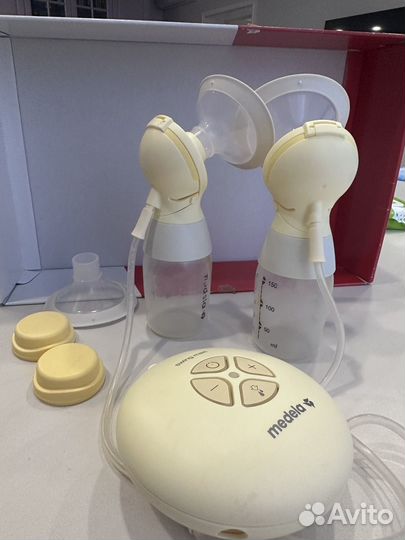 Молокоотсос Medela двойной электрический