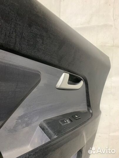 Обшивка двери задняя левая Kia Sportage 3 SL