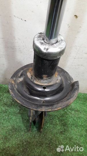 Амортизатор передний левый Chevrolet Captiva C100