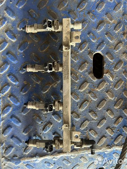 Форсунка топливная Opel Corsa D 1.4