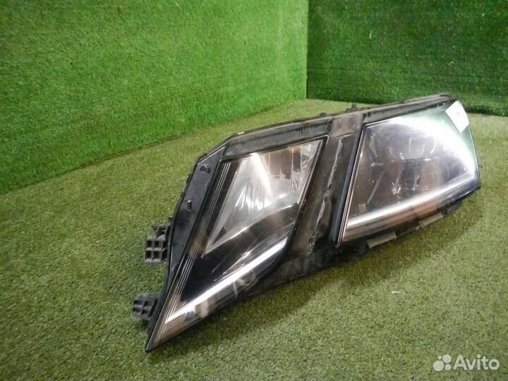Фара левая Skoda Octavia
