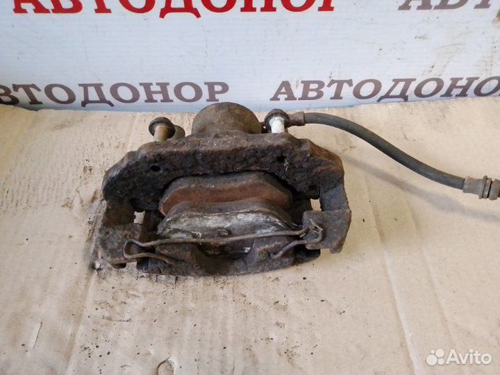 Суппорт тормозной передний правый Mazda 2 1.25