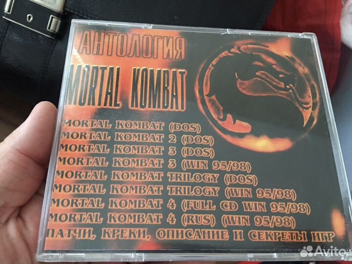 Диск и книга Mortal Kombat