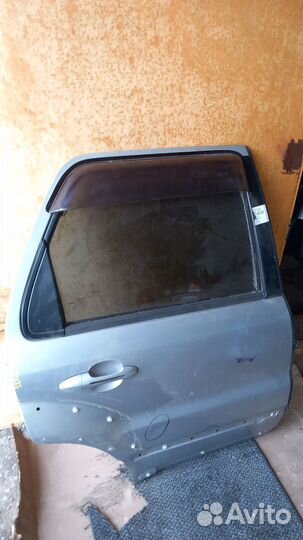 Ford Escape тайванец 2007-09 правая задняя дверь