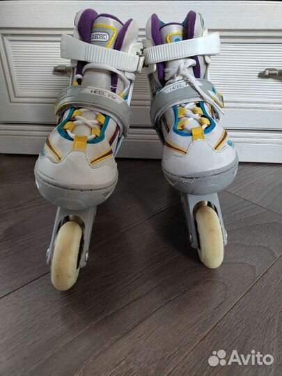 Роликовые коньки