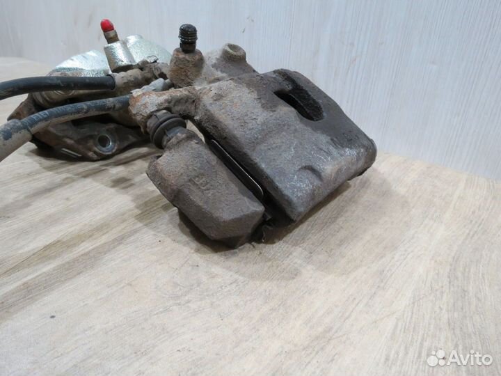 Суппорт передний Volkswagen Polo