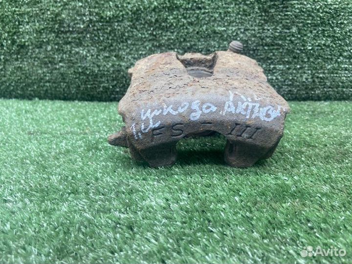 Тормозной суппорт передний левый Skoda Octavia 1