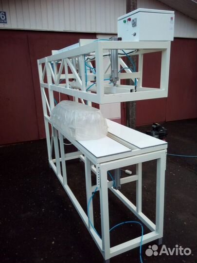 Машина для упаковки пэт бутылок в пленку