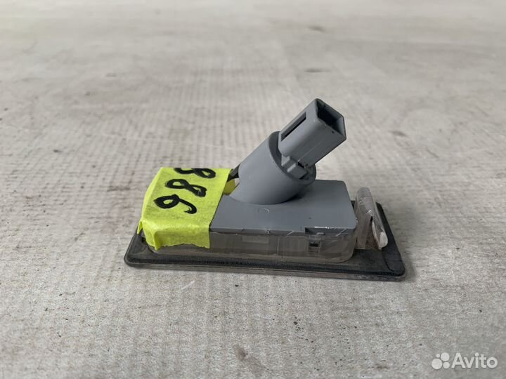 Kia Cerato 13-Фонарь подсветки номера левый