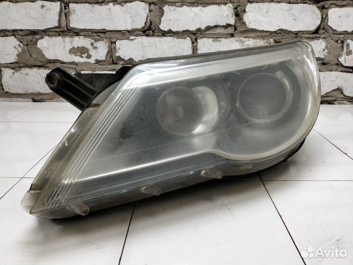 Фара левая Volkswagen Tiguan 1