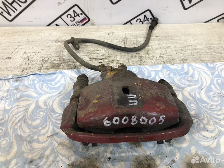 Суппорт тормозной передний Toyota Carina AT190