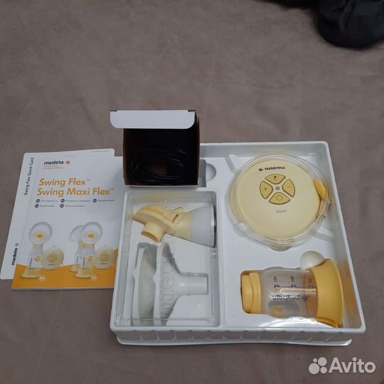 Молокоотсос medela swing flex электрический