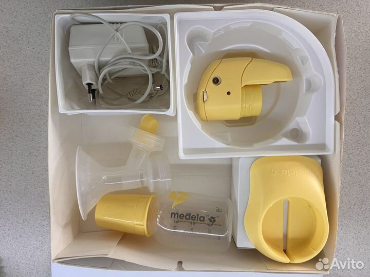 Молокоотсос medela mini electric
