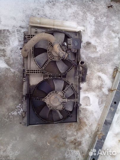 Вентилятор охлаждения на лансер 9