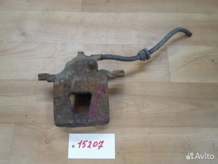 Суппорт передний левый Chevrolet Aveo T250 2005-20