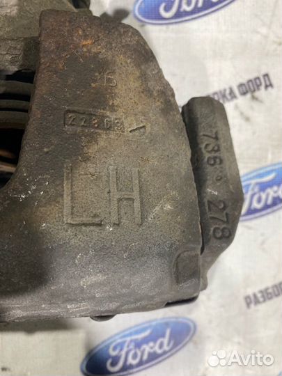 Суппорт тормозной передний левый Ford Focus 2