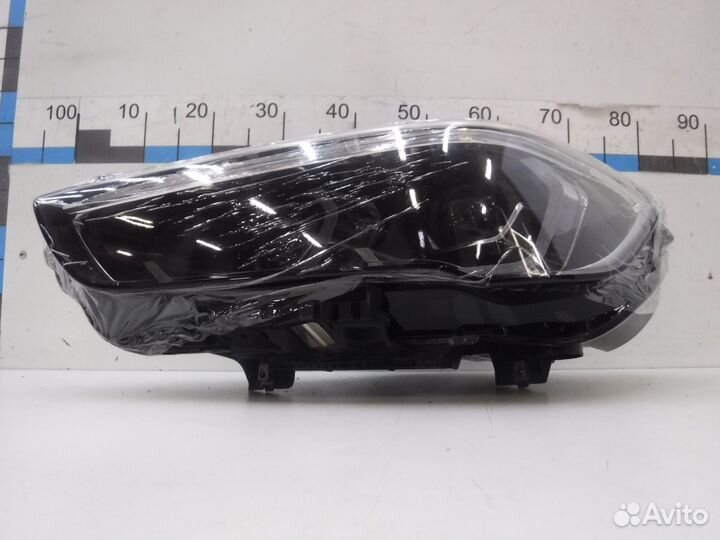 Фара левая BMW X1