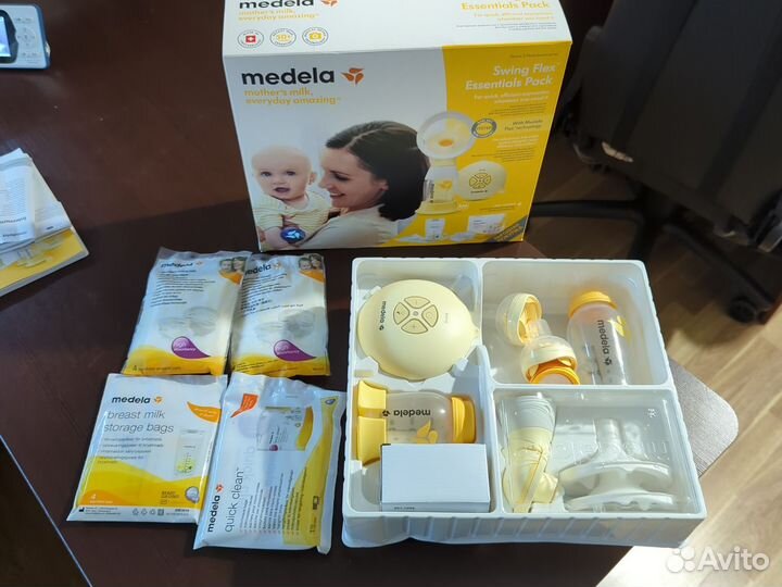 Молокоотсос medela swing flex