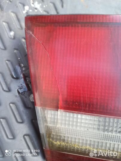 Фонарь крышки багажника левый Toyota Carina E