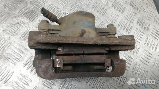 Суппорт тормозной задний правый KIA carnival 2 (KE