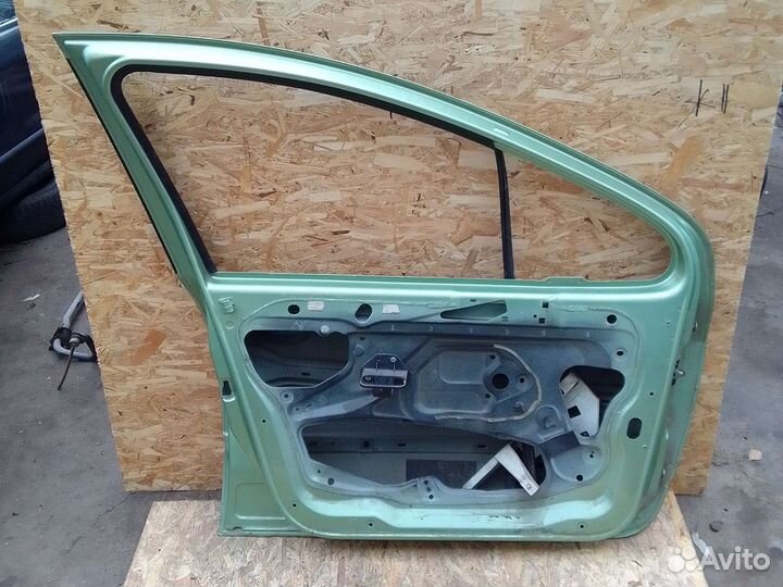 Дверь передний левый peugeot307
