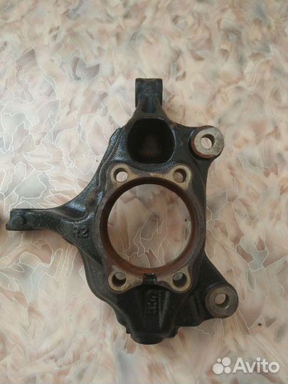 Поворотный кулак передний mazda 6 gj