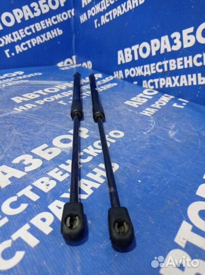 Амортизатор крышки багажника Opel Astra H