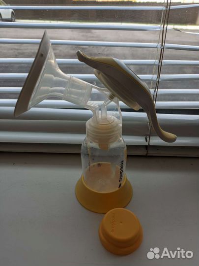Молокоотсос medela ручной