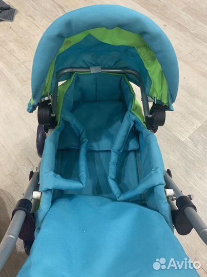 Игрушечная коляска для кукол