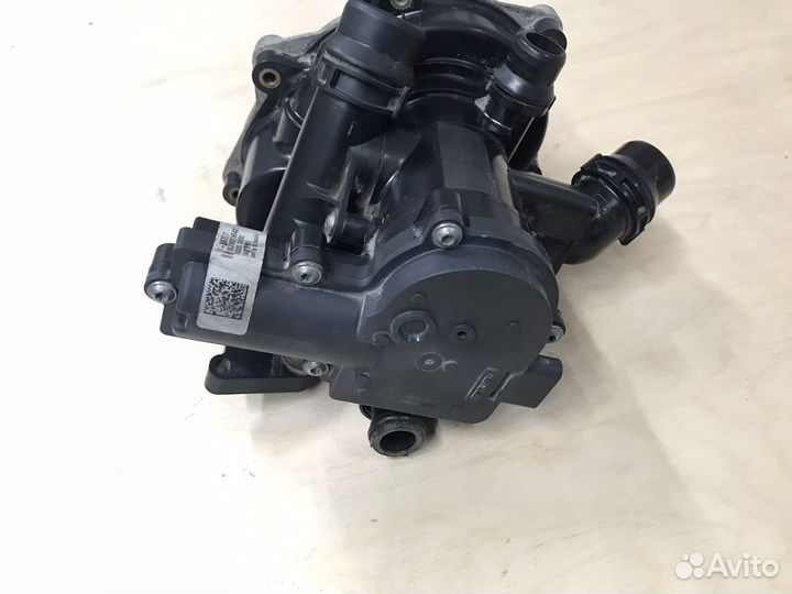 Помпа с термостатом Passat B8