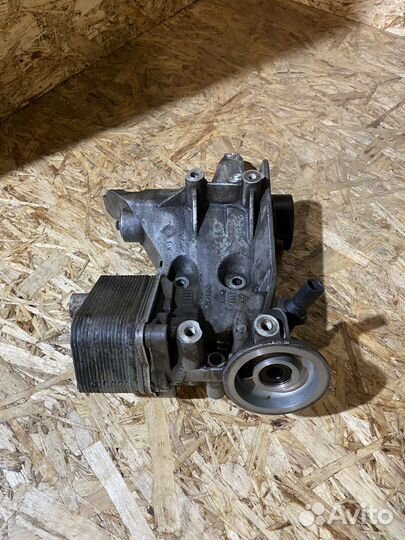 Кронштейн генератора VW Passat B6 05-11