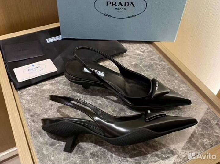 Мюли кожанные туфли Prada