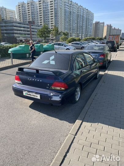 Mitsubishi Lancer 2.0 AT, 2003, битый, 210 000 км