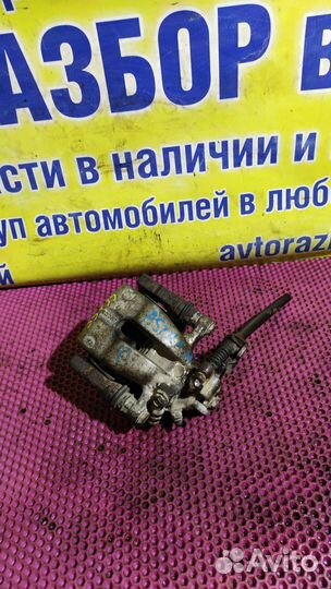 Суппорт тормозной задний правый Opel Astra