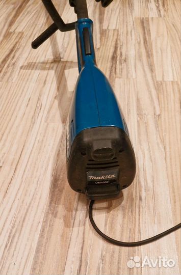 Электрокоса Makita UM4030