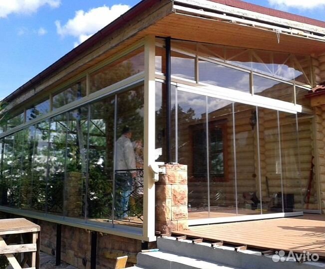 Безрамное раздвижное остекление