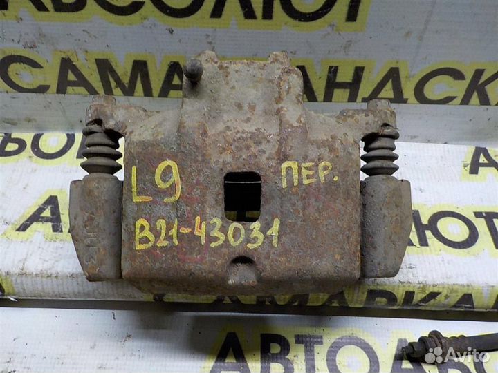 Суппорт передний левый Mitsubishi Lancer 9 (CS) 2