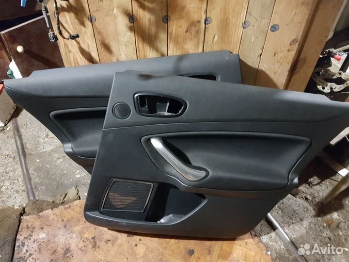 Обшивка двери Ford Mondeo 4