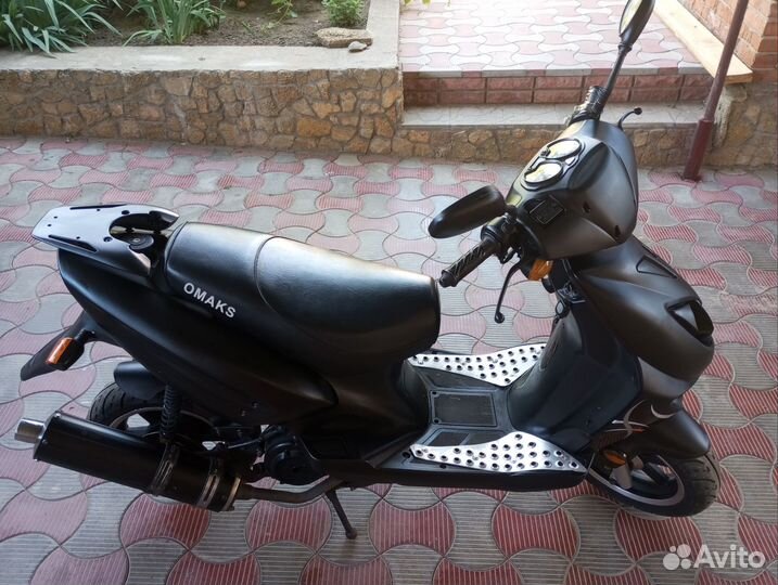 Скутер омакс