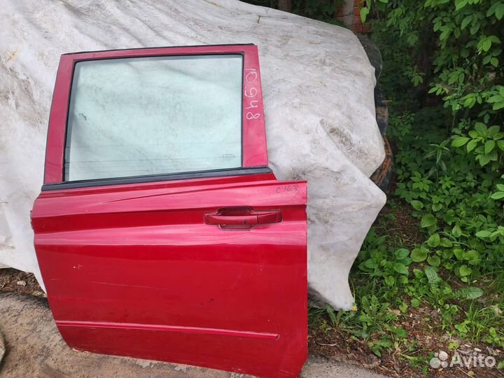 Дверь задняя левая Ssangyong Actyon Sport 1