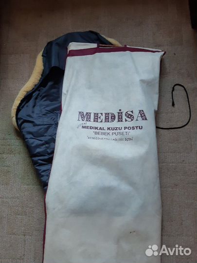 Зимний конверт из шкурки ягненка