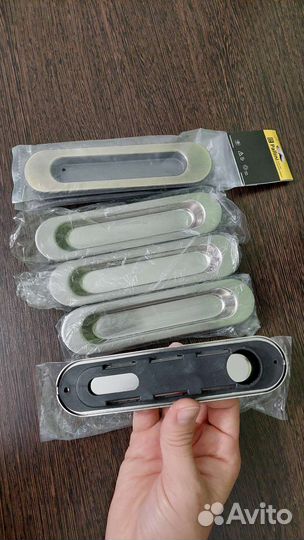 Дверные ручки и стопперы